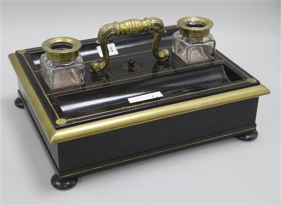 A Gillows brass mounted ebonised inkstand